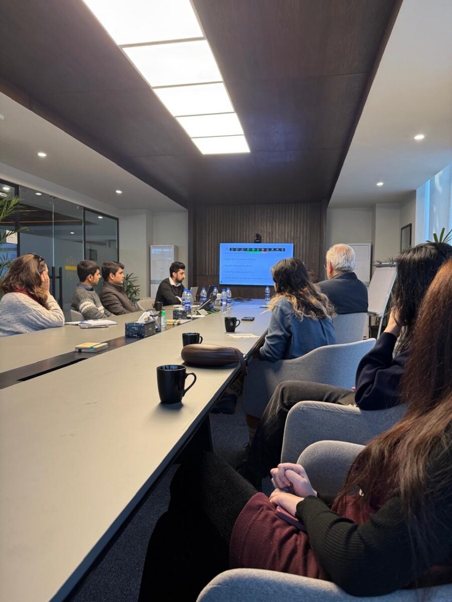 Picture of a team meeting in a conference room